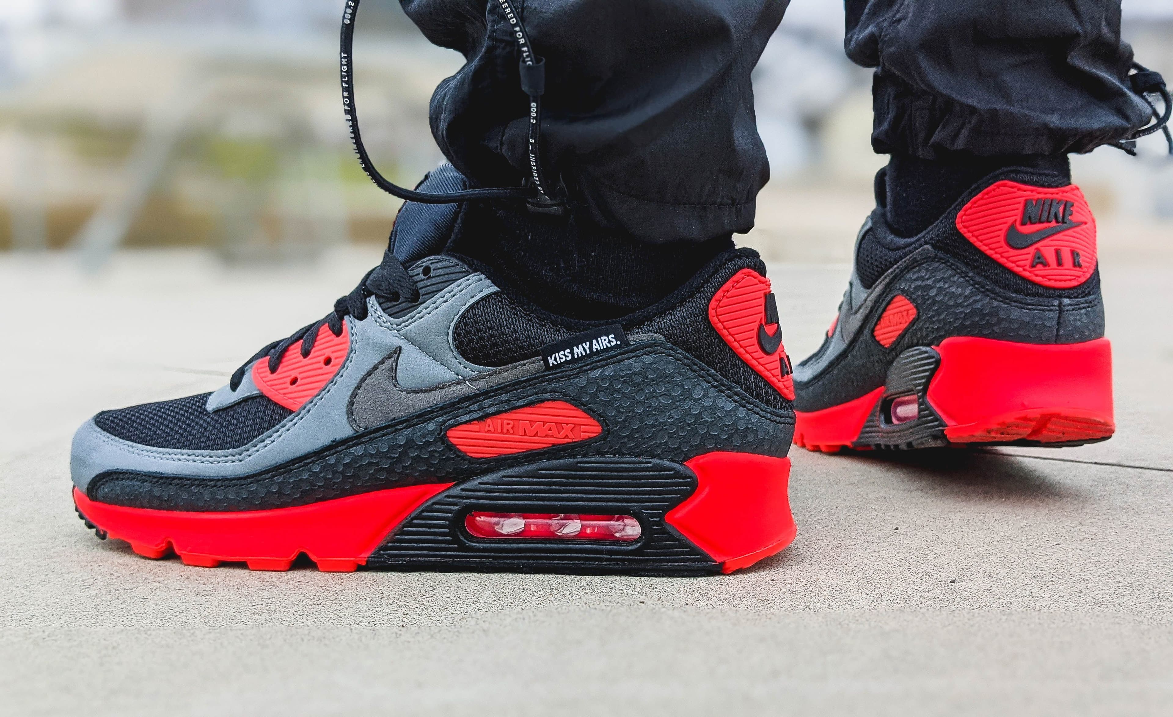 Nike Air Max 90 sneakers in black and red